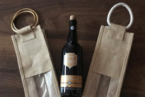 Image showing two Four bottle jute bags and wine bottle