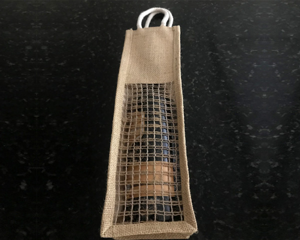 Bottle bag with a wine bottle inside it image