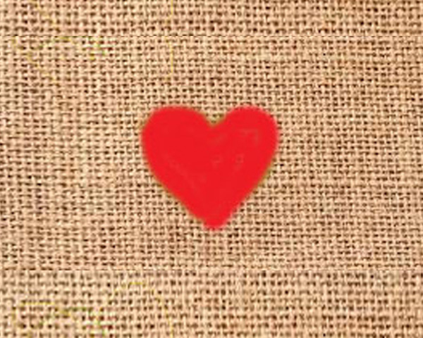 Jute mat with heart symbol in red color image