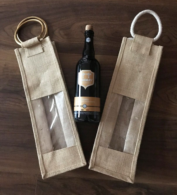 2 jute bags with and a wine bottle image