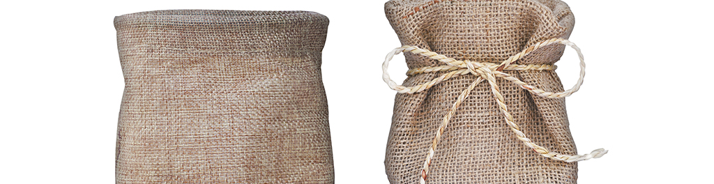 Two burlap sacks, one unrolled and the other tied with twine, showcasing a natural, textured fabric.
